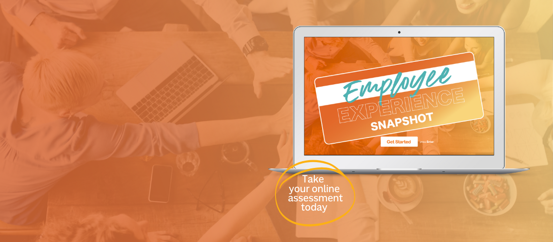 A laptop displaying Employee Experience Snapshot on the screen is in the foreground. The background shows a diverse group of people gathered around a table with drinks. A circular text reads, Take your online assessment today.