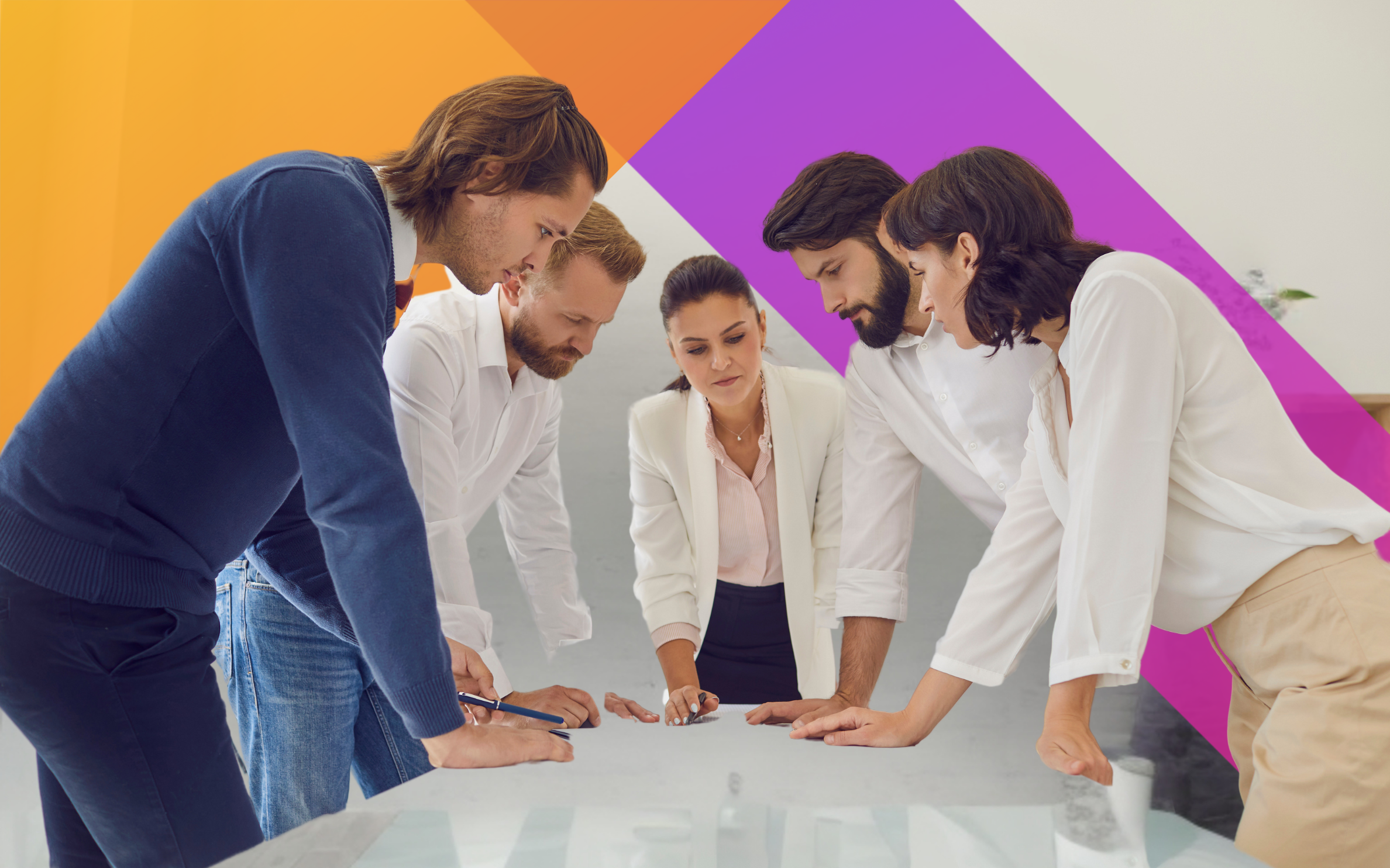 Five people stand around a table in discussion, looking at documents. The background features vibrant orange and purple geometric shapes. The group appears focused and engaged in teamwork.