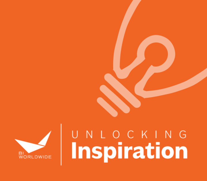 An orange background features a simple line drawing of a lightbulb. Text on the image reads Unlocking Inspiration, with the BI Worldwide logo in the bottom left corner.