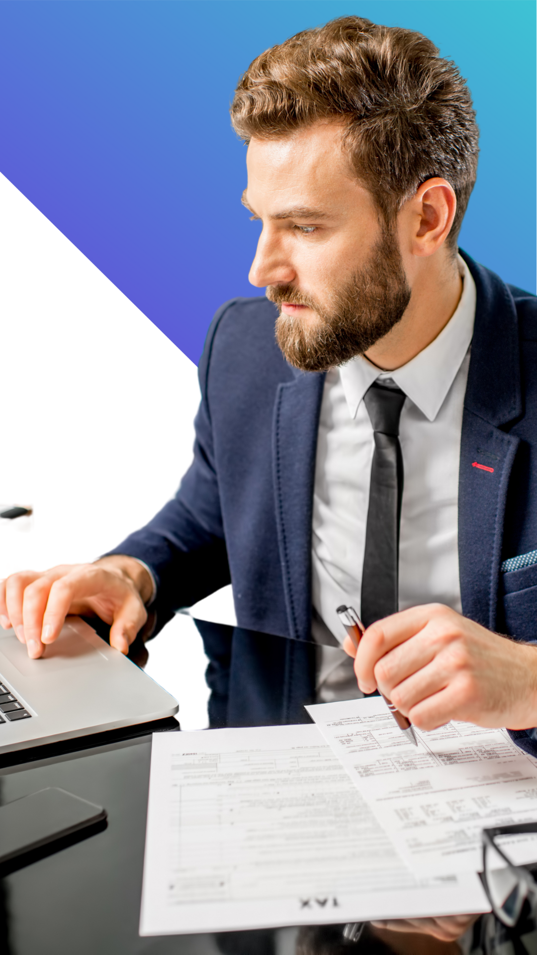 A man in a suit works at a desk with a laptop and documents, holding a pen and concentrating on the screen. The background is a gradient of blue and white.