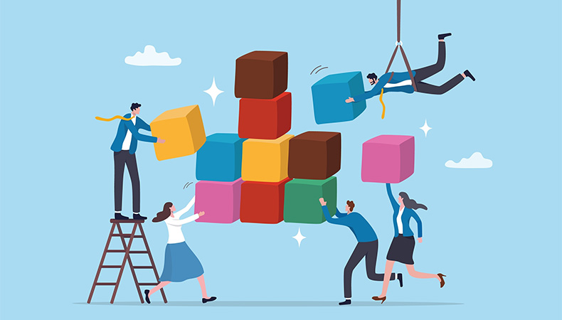 Illustration of five people in business attire collaborating to build a colorful structure with large cubes. One person stands on a ladder, another is lifted by a crane, while others push or support the cubes.