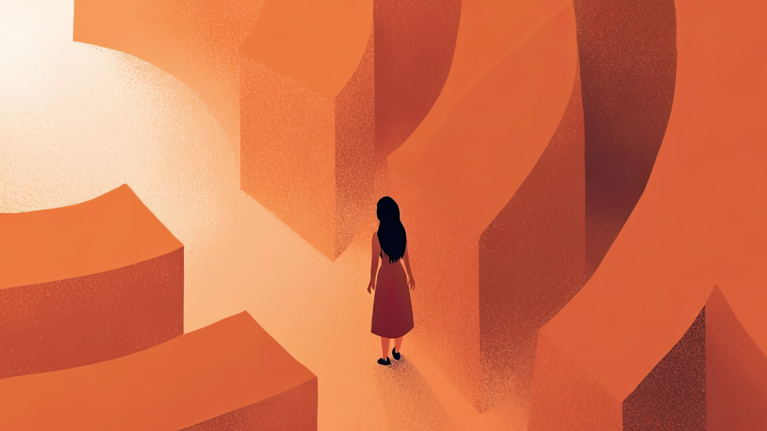 A woman in a red dress stands at the entrance of a large, orange maze, looking toward a bright opening ahead, with tall maze walls casting long shadows.