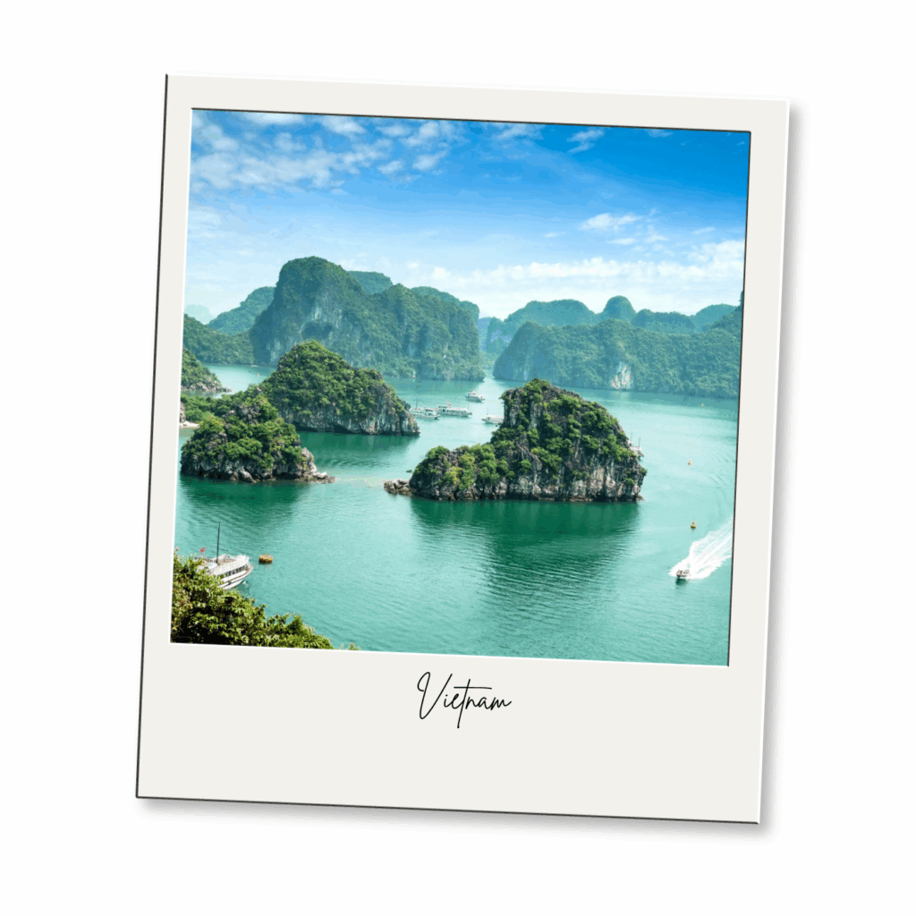 Polaroid-style photo of Ha Long Bay in Vietnam, showing emerald green water, limestone islands covered with greenery, boats, and a blue sky with clouds. The word Vietnam is written below the image.