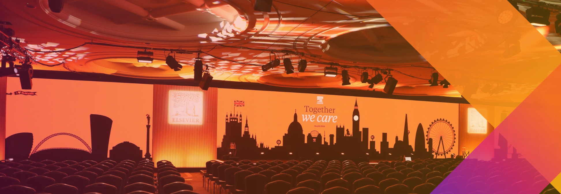 An empty conference room with rows of chairs facing a large stage backdrop featuring a silhouette of the London skyline, the Elsevier logo, and the text Together we care.