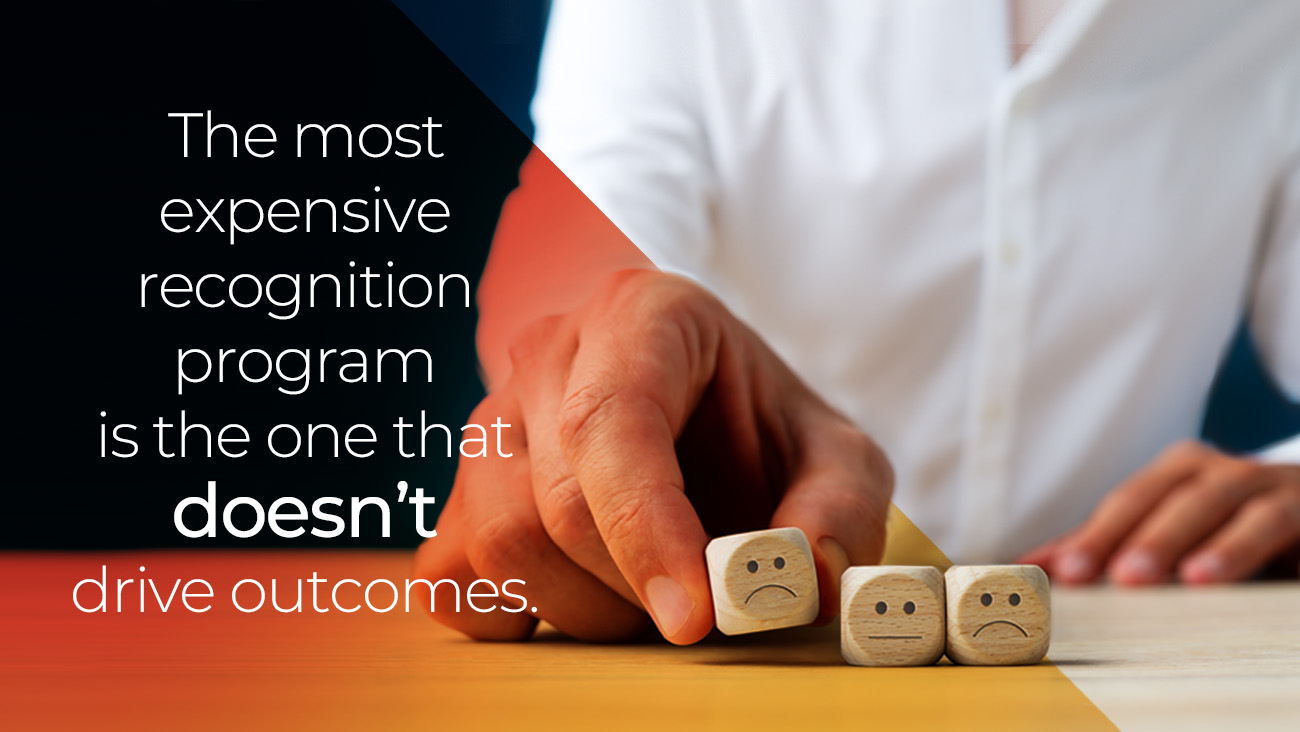 A person in a white shirt arranges three wooden blocks with sad faces. The text reads, The most expensive recognition program is the one that doesn’t drive outcomes.