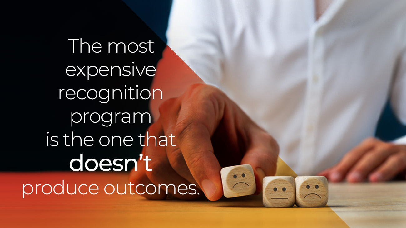 A person in a white shirt pushes three wooden blocks with sad faces. The text reads: The most expensive recognition program is the one that doesnt produce outcomes.