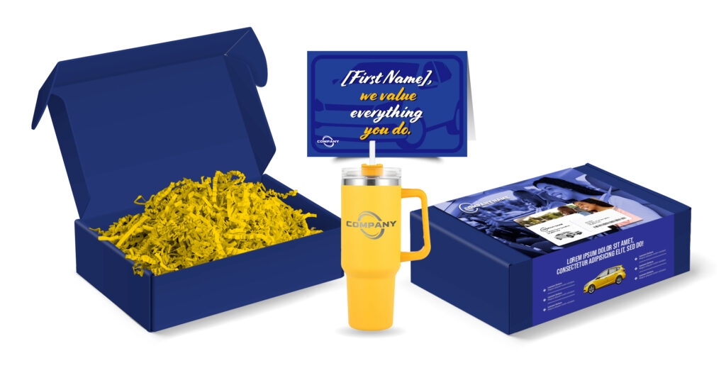 A blue gift box with yellow paper filler, a yellow tumbler labeled Company, and an insert card reading [First Name], we value everything you do. Another box with company branding and marketing materials is displayed nearby.