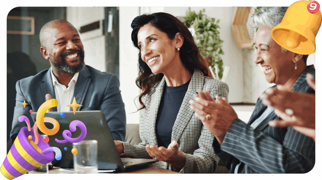 Three colleagues in business attire sit at a table, smiling and clapping during a meeting. Festive confetti and party emojis are overlaid, creating a celebratory atmosphere.