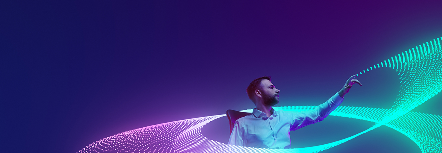 A man in a white shirt sits and reaches out with his right hand, surrounded by dynamic, glowing blue and purple digital wave patterns on a dark gradient background.