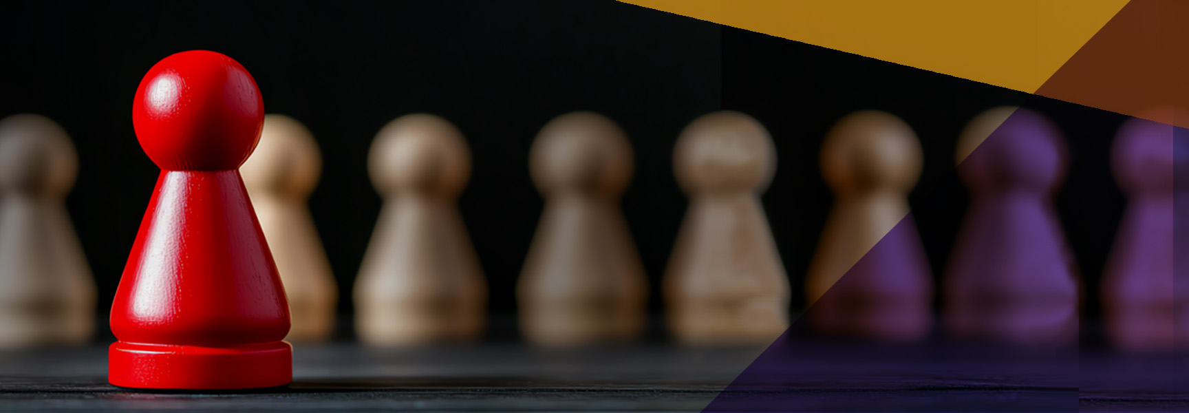 A bright red pawn stands in sharp focus in the foreground, while several beige pawns are blurred in the background. Diagonal translucent gold and purple shapes overlay the right side of the image.