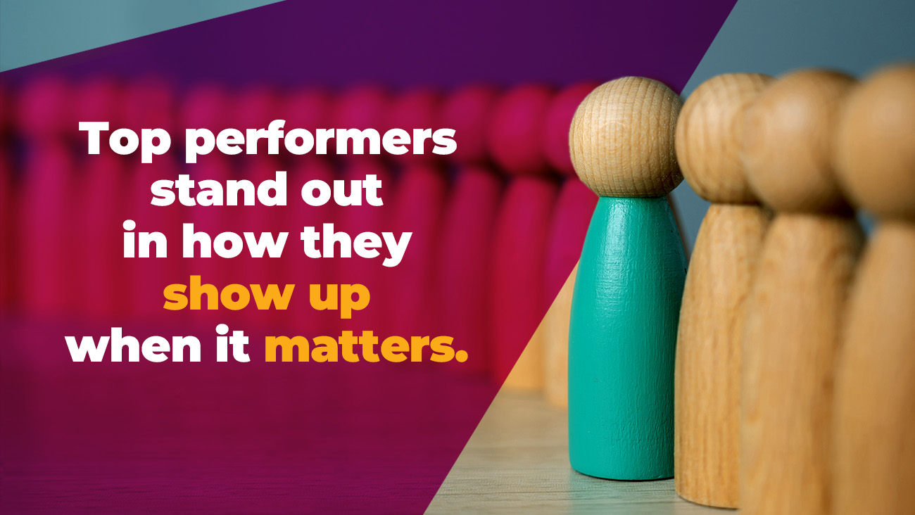 A teal wooden figure stands out from a row of tan figures. Text reads: Top performers stand out in how they show up when it matters.